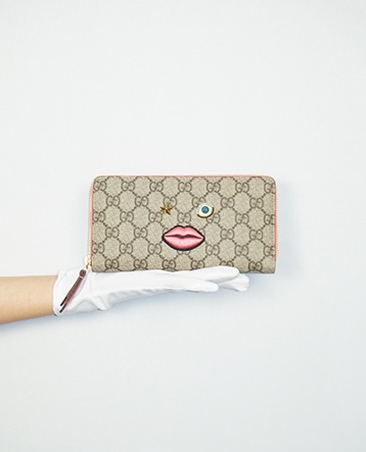 Gucci Embroidered Face Zippy Wallet, front view